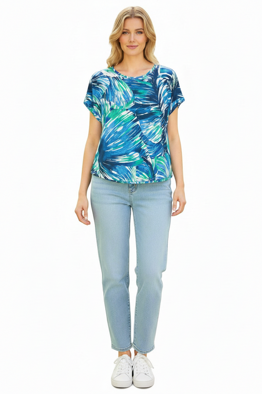 Equinox Clothing blue printed short sleeve jersey top with a relaxed fit worn with light wash jeans and white sneakers