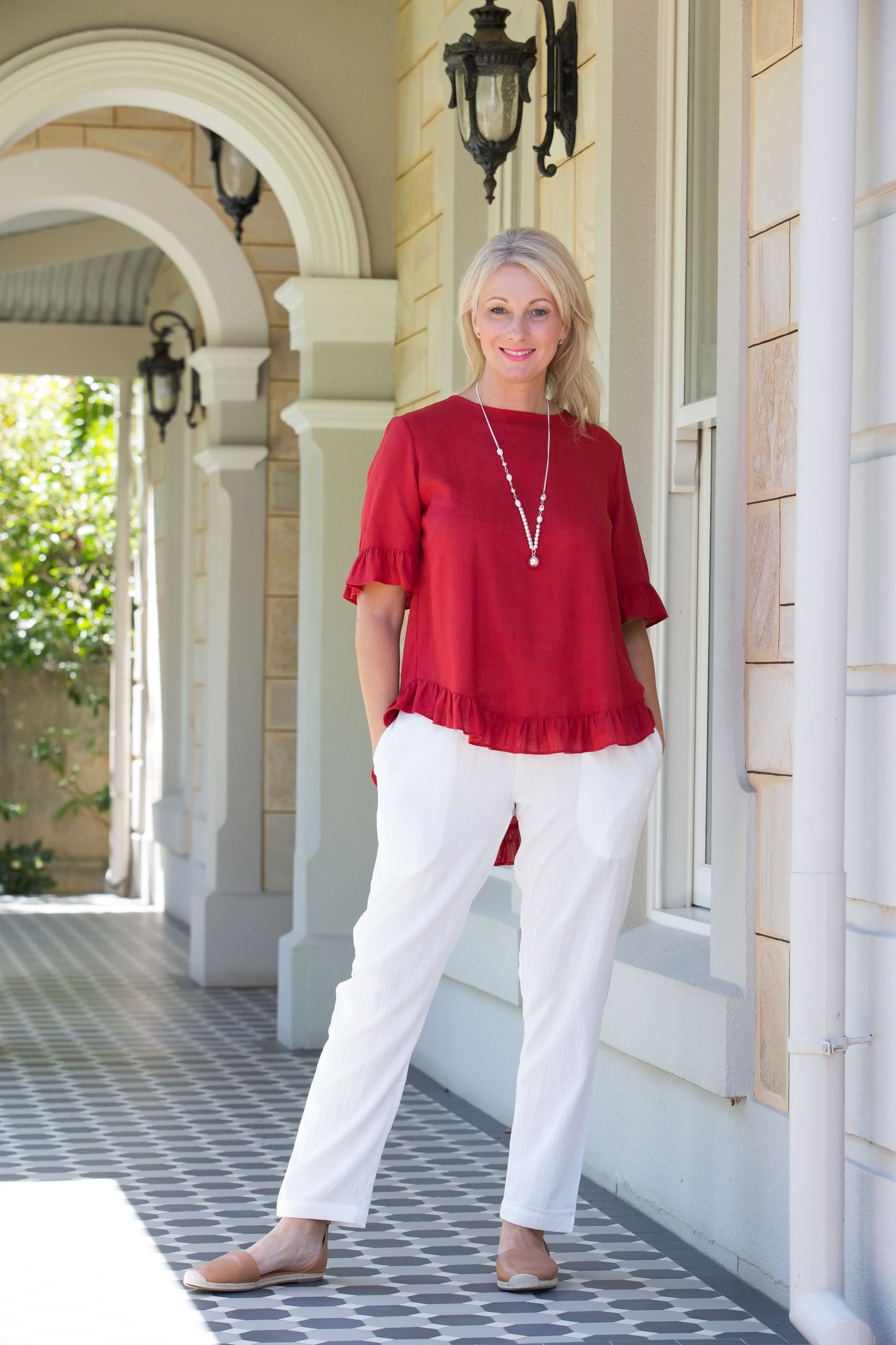Linen Blend Short sleeve top with ruffle sleeve and hem edge finish #493 Paprika