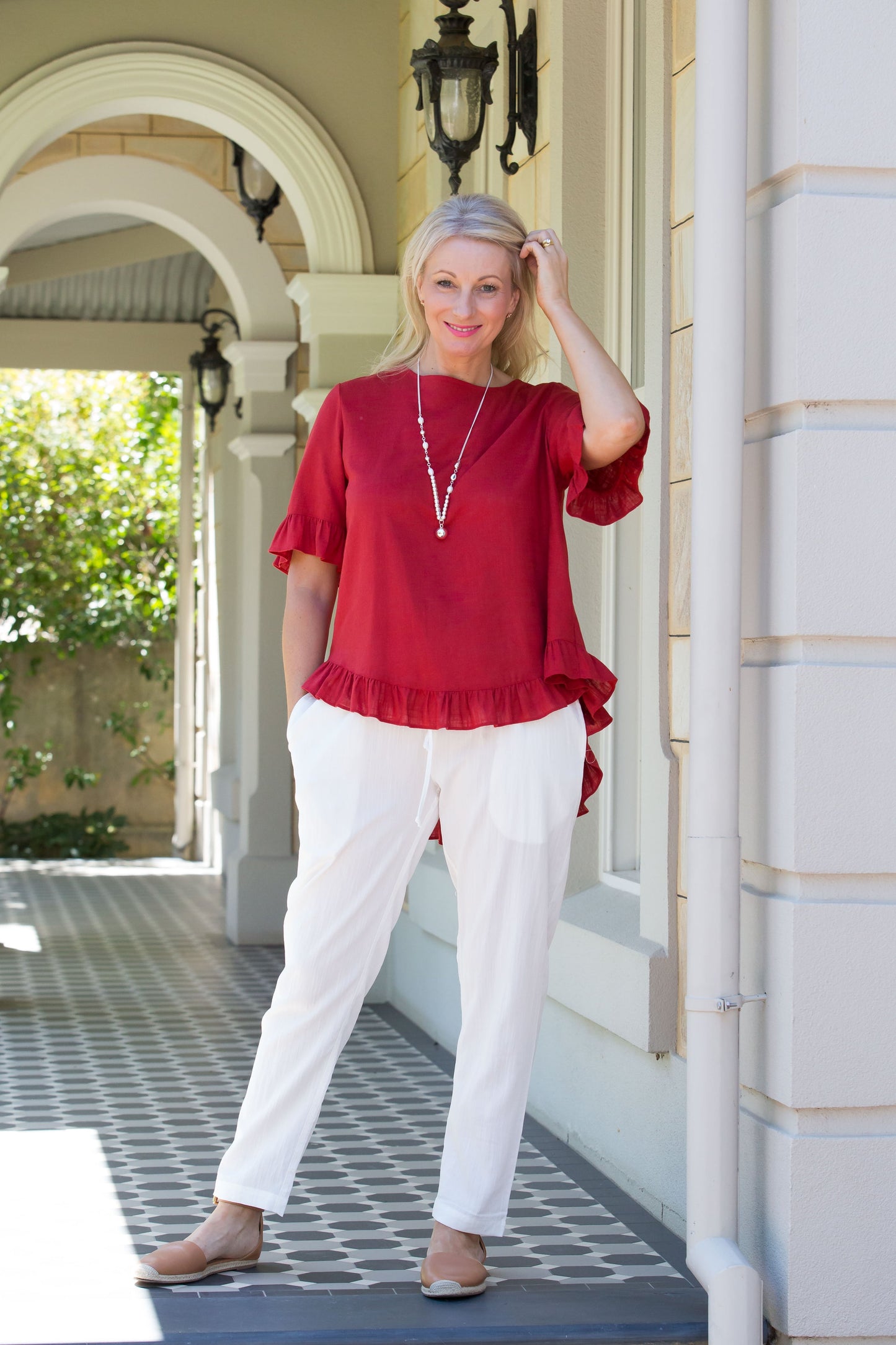 Linen Blend Short sleeve top with ruffle sleeve and hem edge finish #493 Paprika