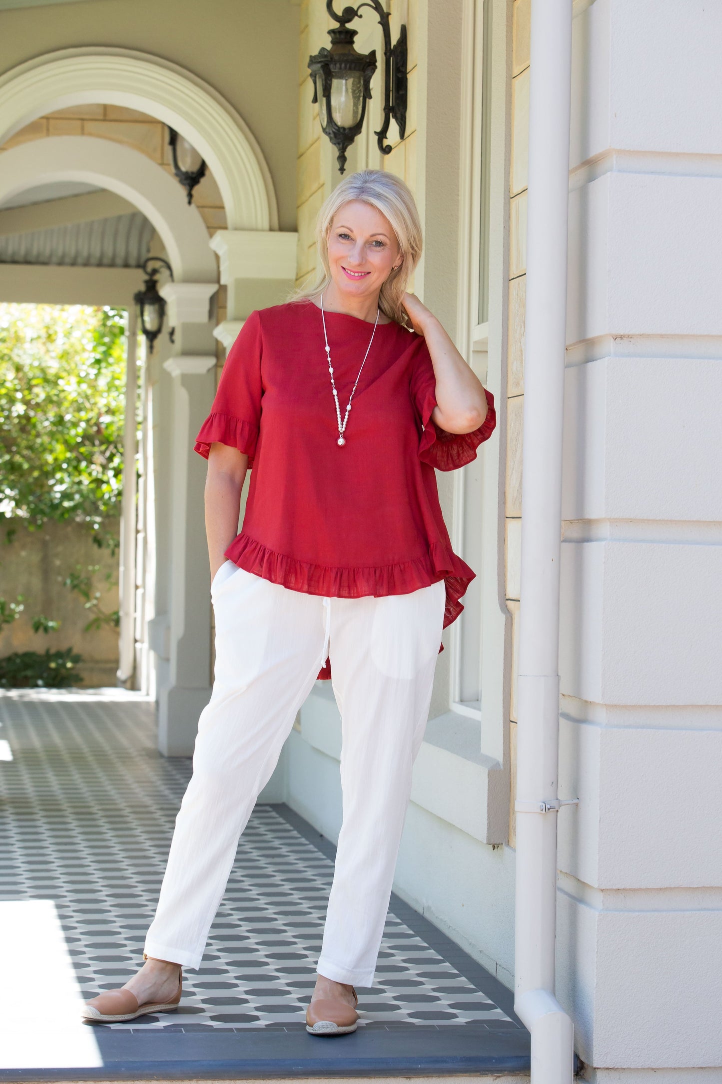 Linen Blend Short sleeve top with ruffle sleeve and hem edge finish #493 Paprika