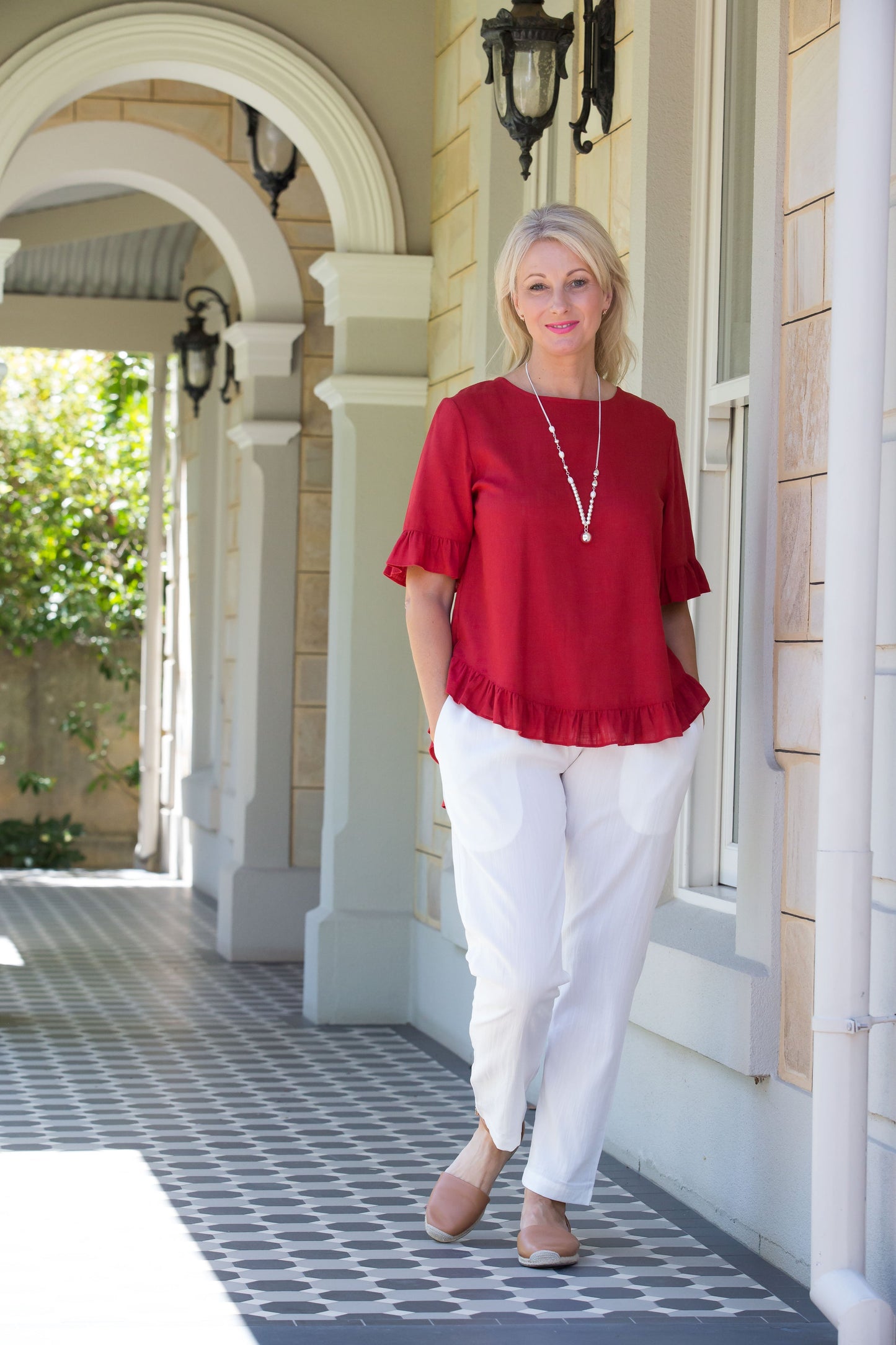 Linen Blend Short sleeve top with ruffle sleeve and hem edge finish #493 Paprika
