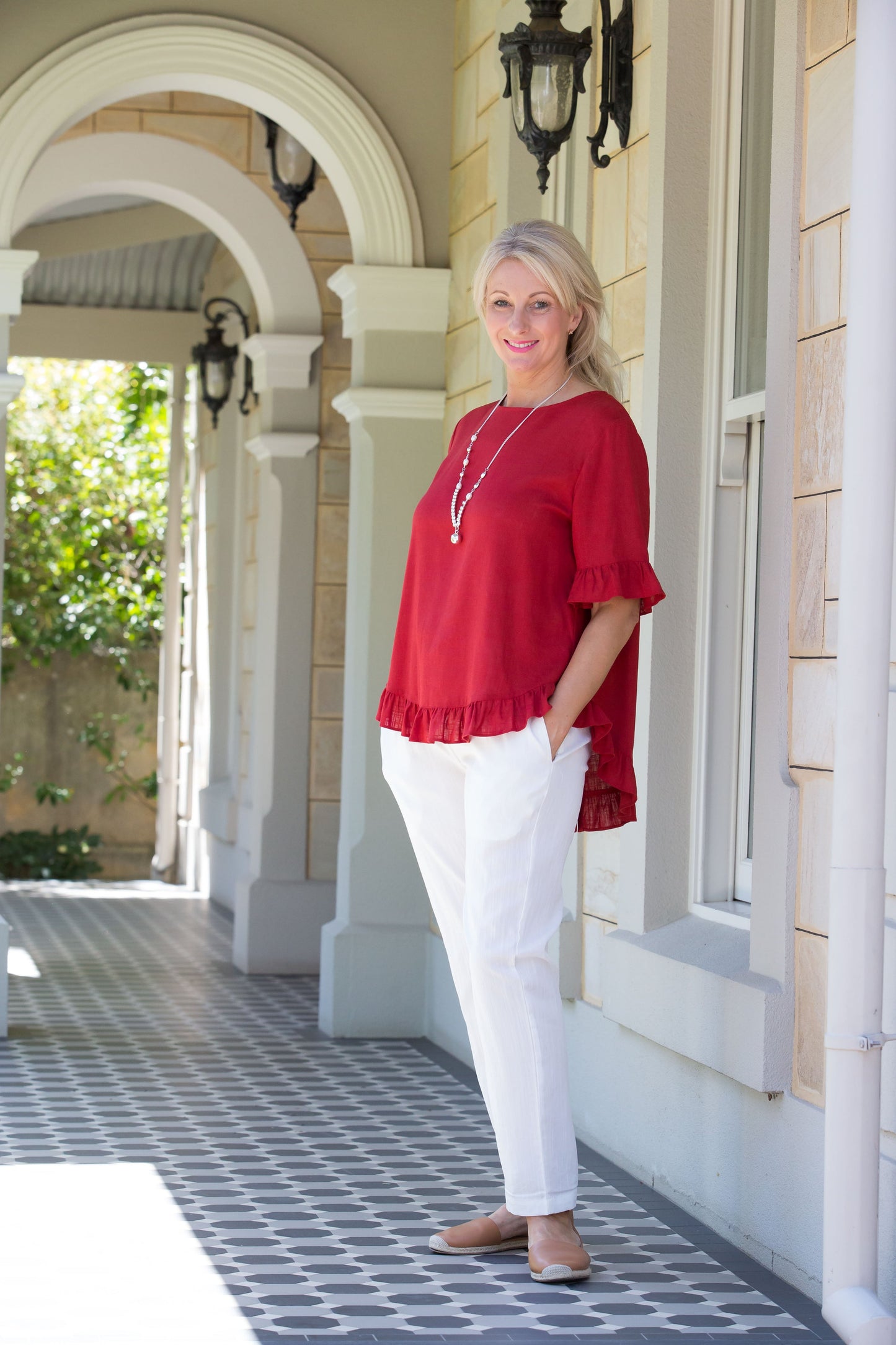 Linen Blend Short sleeve top with ruffle sleeve and hem edge finish #493 Paprika