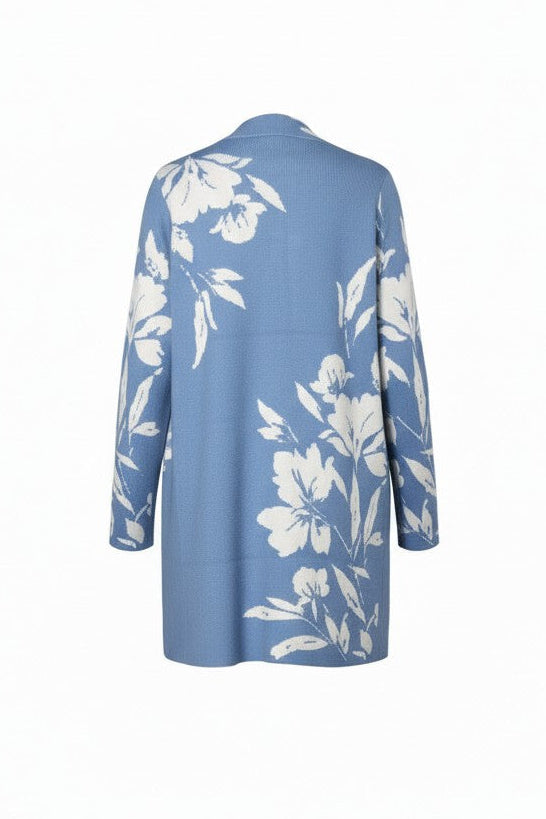 Blue cardigan with white floral pattern on a white background