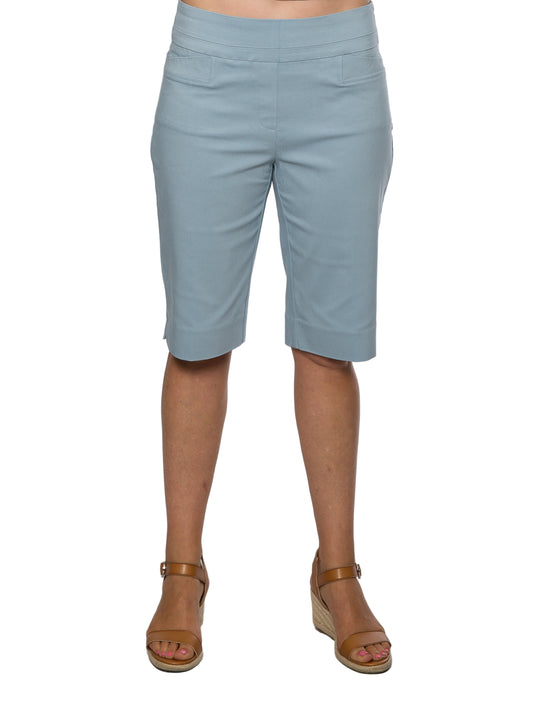 A pair of knee-length bengaline shorts in an ocean blue color, featuring back patch pockets, modeled against a plain background.