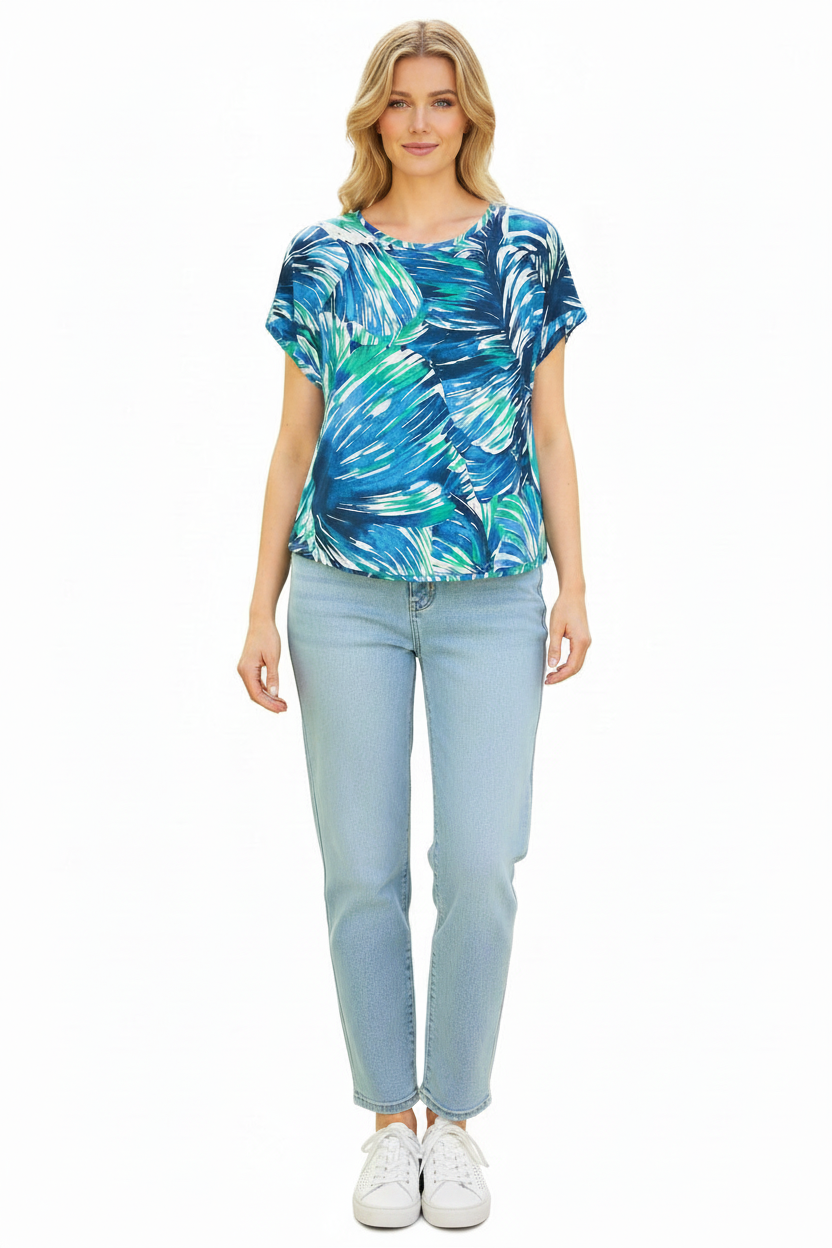 Equinox Clothing blue printed short sleeve jersey top with a relaxed fit worn with light wash jeans and white sneakers