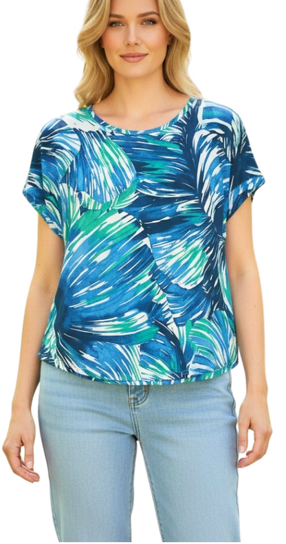 Equinox Clothing blue printed short sleeve jersey t-shirt with a tropical leaf pattern worn by a blonde model