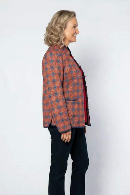 Equinox Clothing reversible oriental jacket in red and navy floral print with quilted fabric and button loop closure