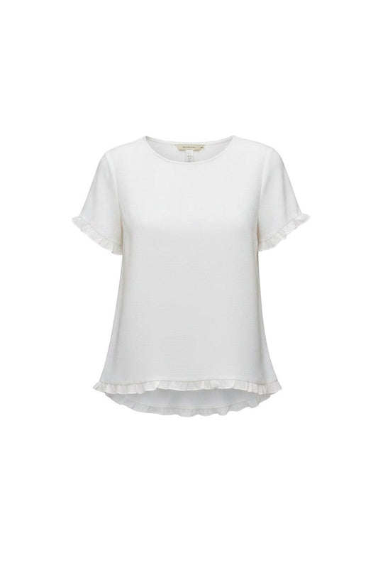 Equinox Clothing white Tencel short-sleeve top with feminine ruffle trim on the sleeves and hemline.